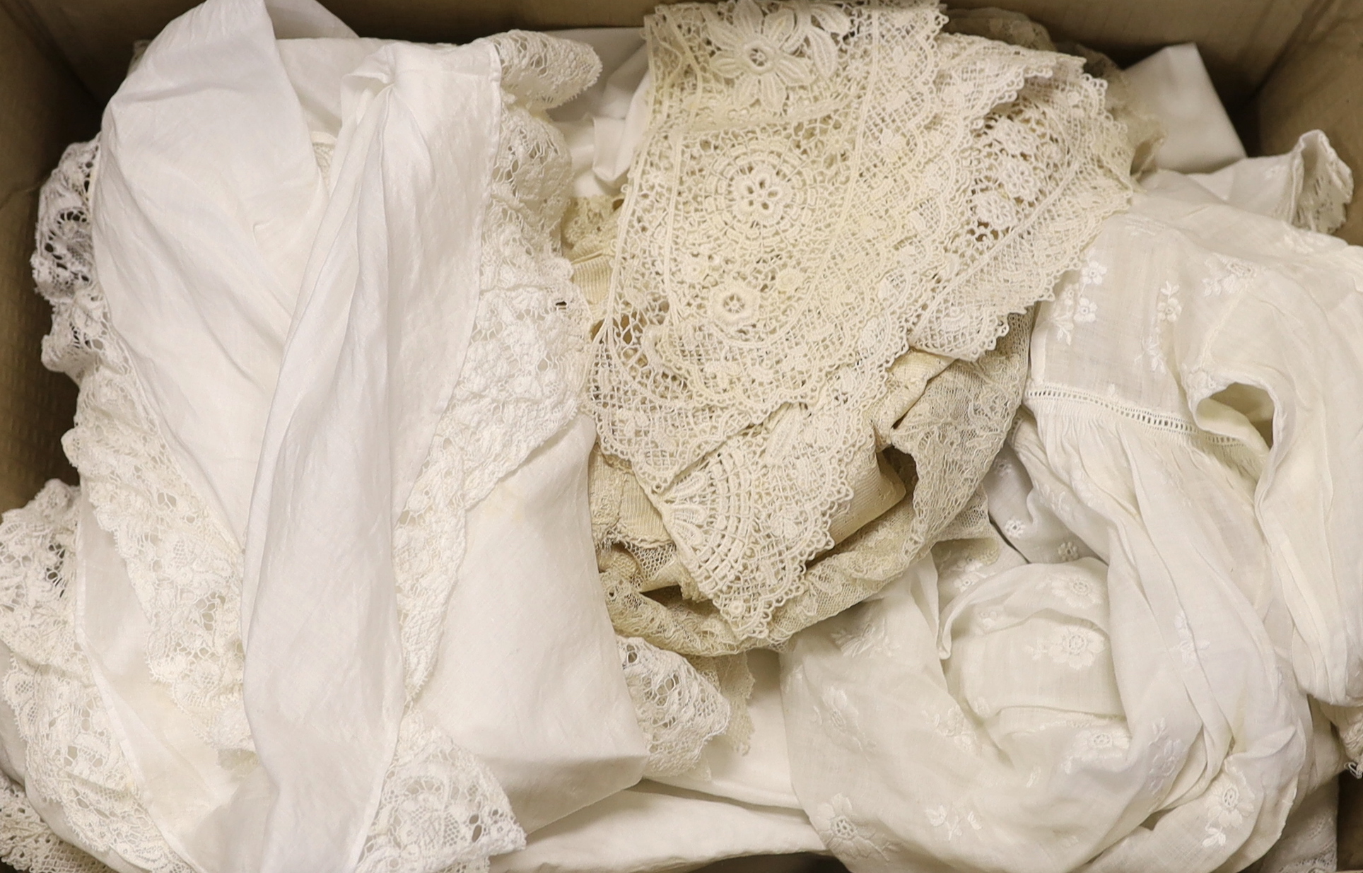 A small collection of early 20th century linen, crochet edge mats, cloths, a petticoat, Bertha, lace stole, etc.